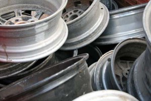 Lots of car wheels ready to be recycled by Tall Ingots